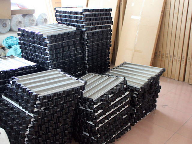 Stacked sauna heater components ready for assembly
